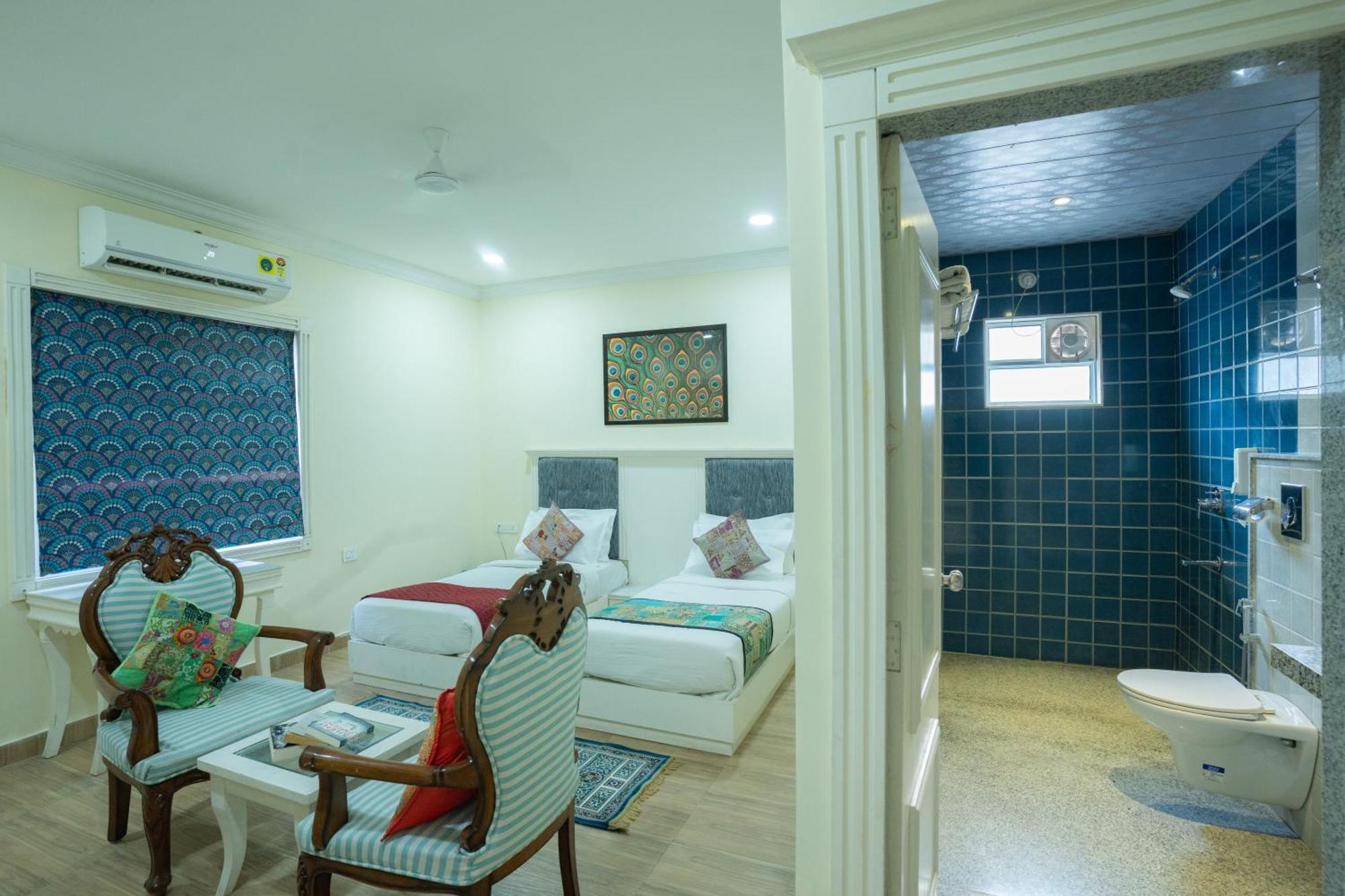 Hotel Tripli White Manor Udaipur